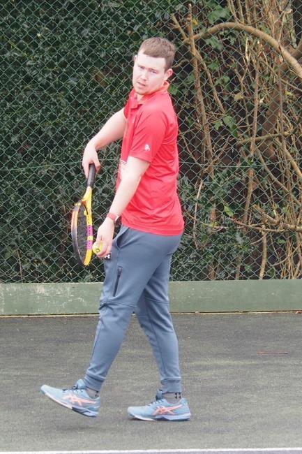 Nathan gets ready to serve